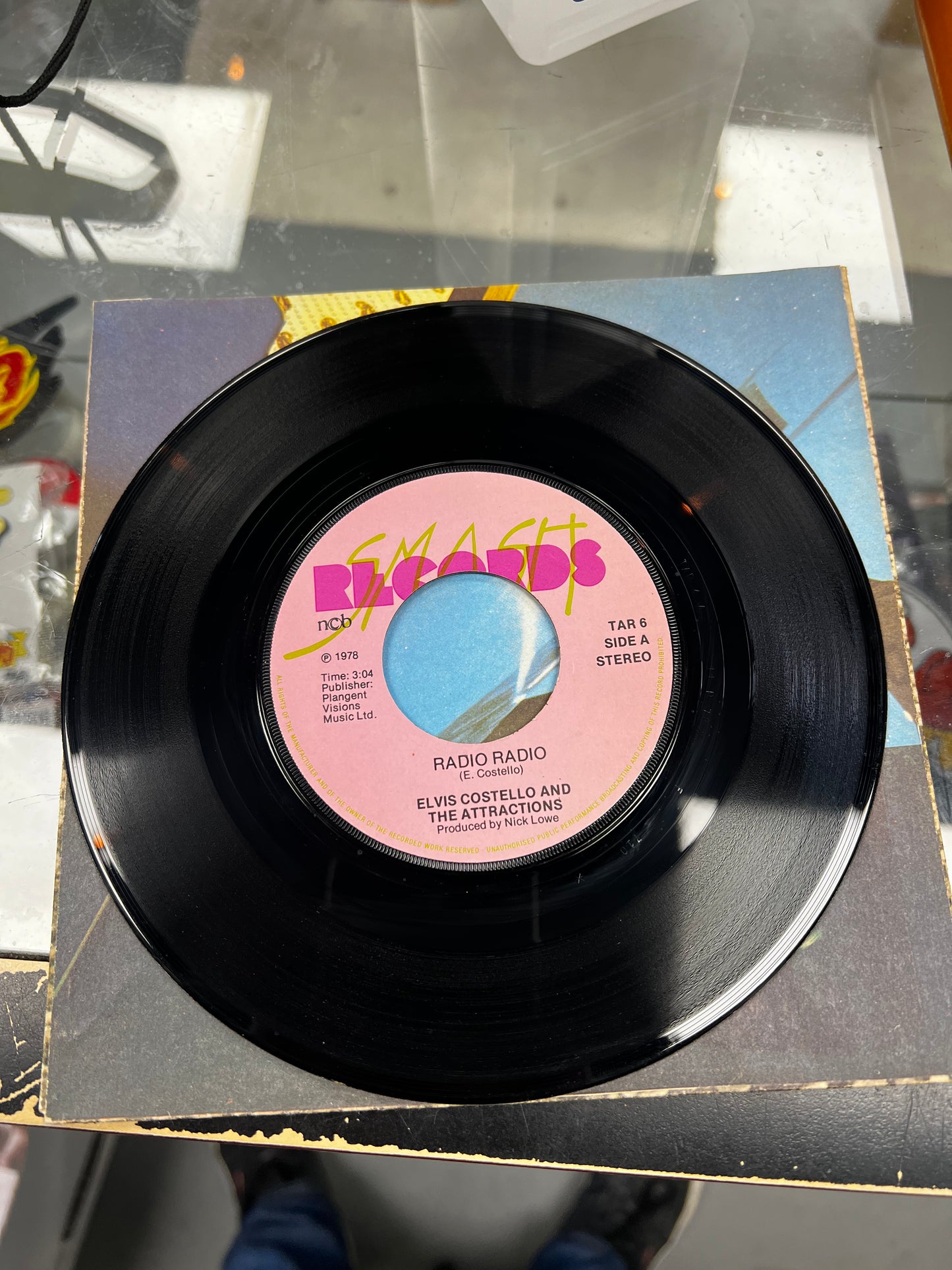 Elvis Costello And The Attractions* – Radio Radio 7”